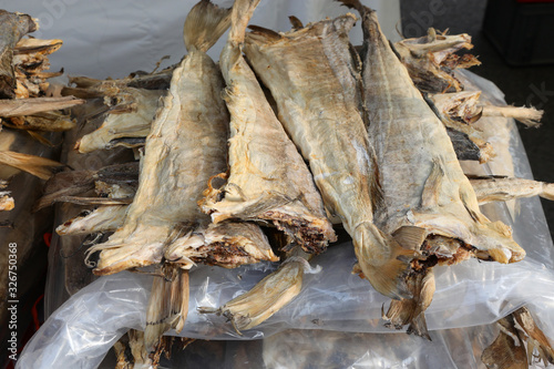 many dried headless stockfish dried in the sun for sale