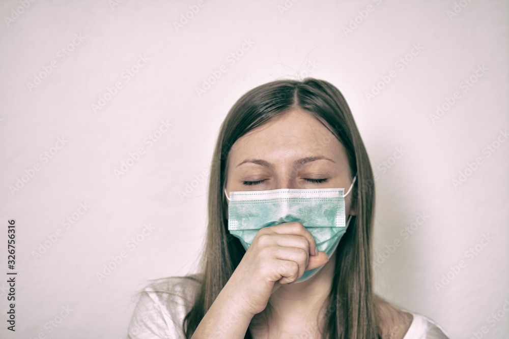 Girl with mask to protect her from Corona virus. Corona virus pandemic. Wuhan coronavirus and epidemic virus symptoms. Girl with mask to protect her from Corona virus. Corona virus pandemic. Wuhan coronavirus and epidemic virus symptoms.