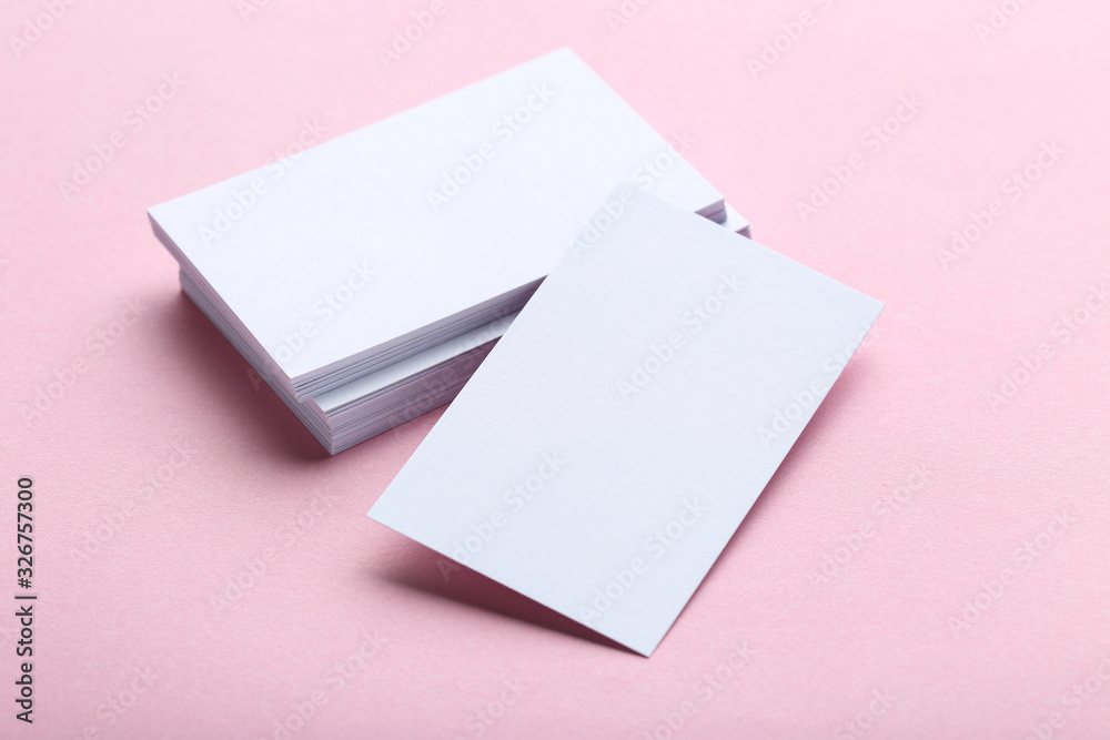 Blank business cards on pink background Blank business cards on pink background