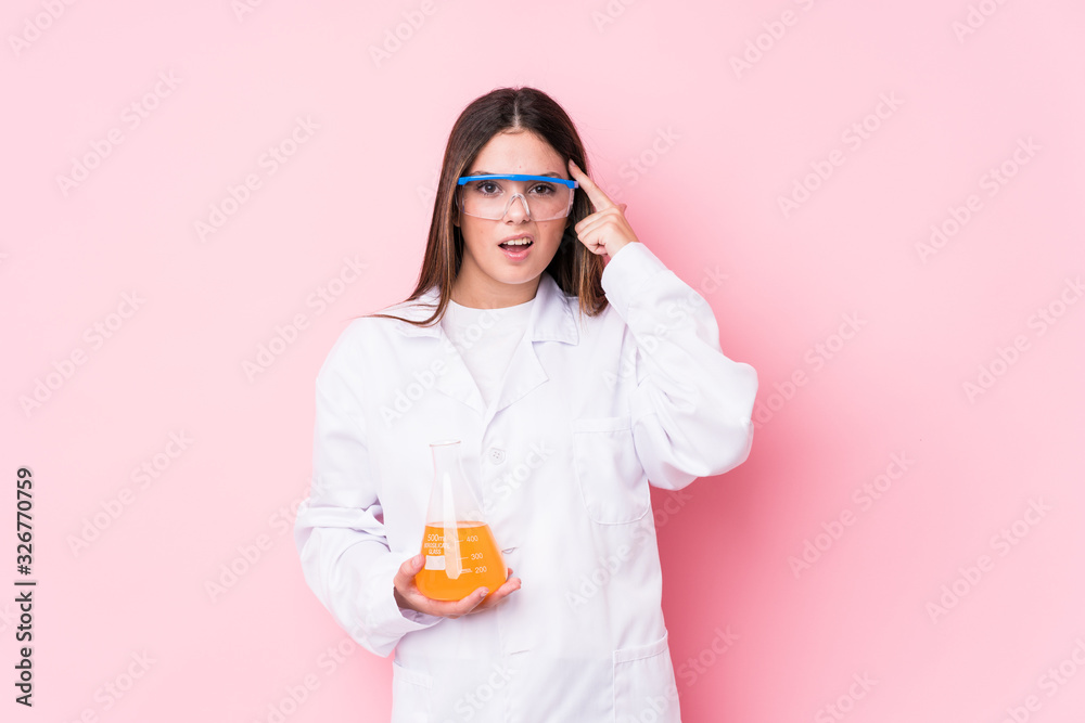 Young chemical woman isolated showing a disappointment gesture with forefinger. Young chemical woman isolated showing a disappointment gesture with forefinger.