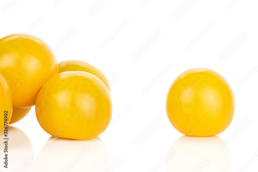 Group of five whole fresh yellow tomato isolated on white background Group of five whole fresh yellow tomato isolated on white background