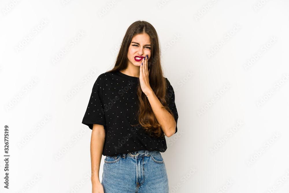 Young caucasian woman isolated on white background having a strong teeth pain, molar ache.