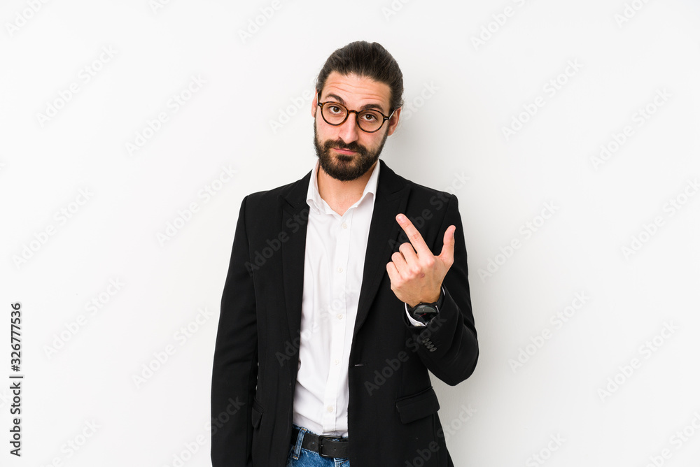 Young caucasian business man isolated on a white background pointing with finger at you as if inviting come closer. Young caucasian business man isolated on a white background pointing with finger at you as if inviting come closer.