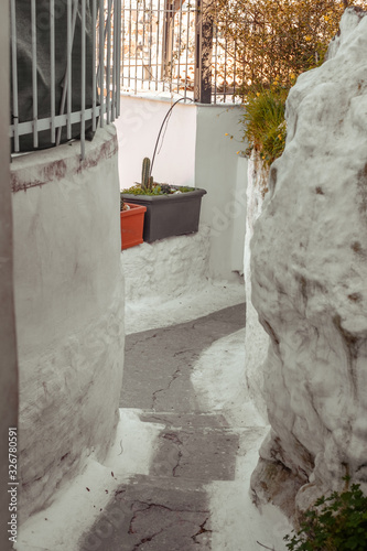 Fototapeta Naklejka Na Ścianę i Meble -  Architectural details from the narrow streets of Plaka, a traditional neighborhood in Athens, on the slopes of Acropolis, Greece