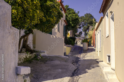Fototapeta Naklejka Na Ścianę i Meble -  Architectural details from the narrow streets of Plaka, a traditional neighborhood in Athens, on the slopes of Acropolis, Greece
