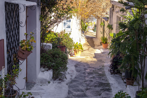 Fototapeta Naklejka Na Ścianę i Meble -  Architectural details from the narrow streets of Plaka, a traditional neighborhood in Athens, on the slopes of Acropolis, Greece