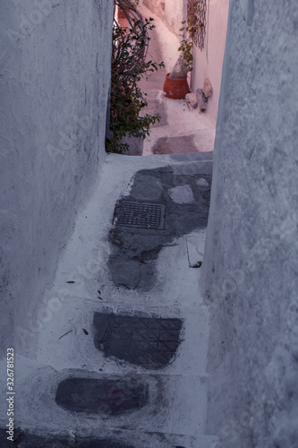 Fototapeta Naklejka Na Ścianę i Meble -  Architectural details from the narrow streets of Plaka, a traditional neighborhood in Athens, on the slopes of Acropolis, Greece