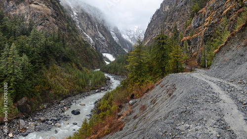 Annapurna Circuit track. View at Marsyangdi river gorge. Outskirts of Chame village.