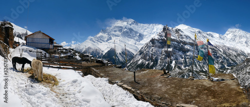 Annapurna Circuit track. View at Anapurna from Ghyaru village. photo