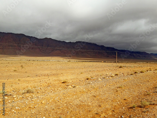 A road in the desert to the oasis of Figuig in Morocco  photo