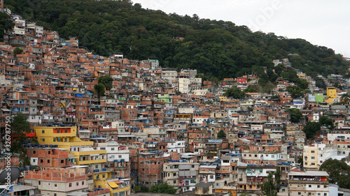 Rocinha is the largest favela in Brazil, located in Rio de Janeiro's South Zone between the districts of São Conrado and Gavea. 