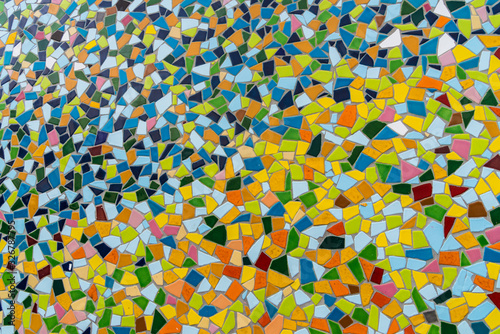 Pattern texture of colorful small mosaic tiles on the wall