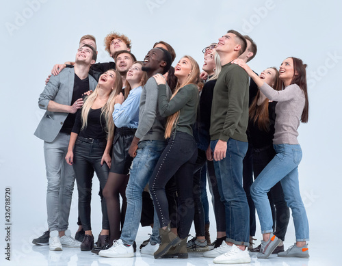 Φωτογραφία large group of diverse young people looking up hopefully
