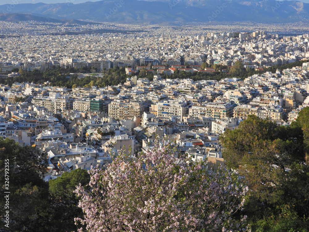 Obraz premium Zoom photo of urban dense populated city of Athens as seen from Lycabettus hill at spring, Attica, Greece