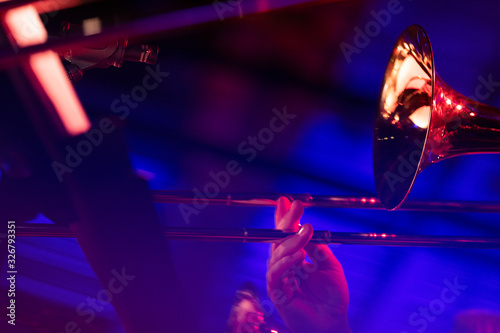 Photography Musicians of a big band trombone section are laying down some smooth jazz during