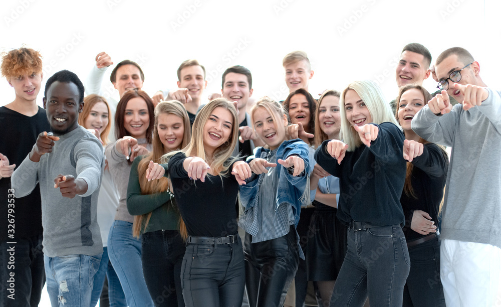 group of confident young people pointing at you