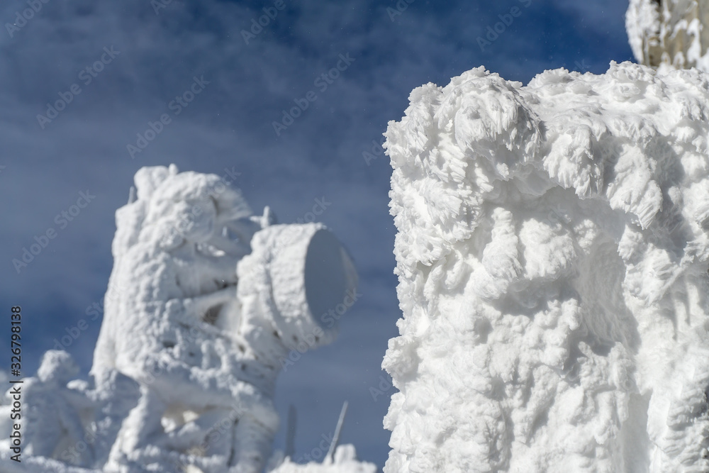FROZEN BUILDINGS ON THE MOUNTAIN TOP
