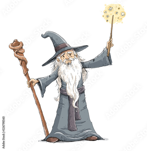 Photography Old sorcerer doing magic with wand