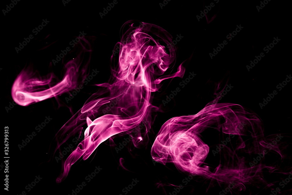 Obraz premium Purple smoke on black background