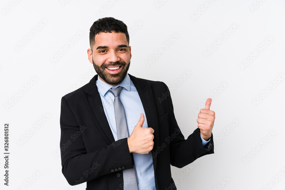 Young latin business woman against a white background isolated raising both thumbs up, smiling and confident. Young latin business woman against a white background isolated raising both thumbs up, smiling and confident.