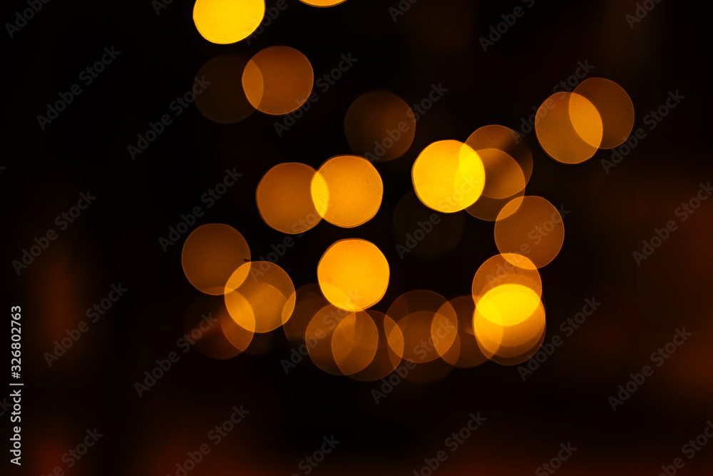 Fototapeta premium Multiple large golden bokeh balls on blurred background. High quality texture for creative work