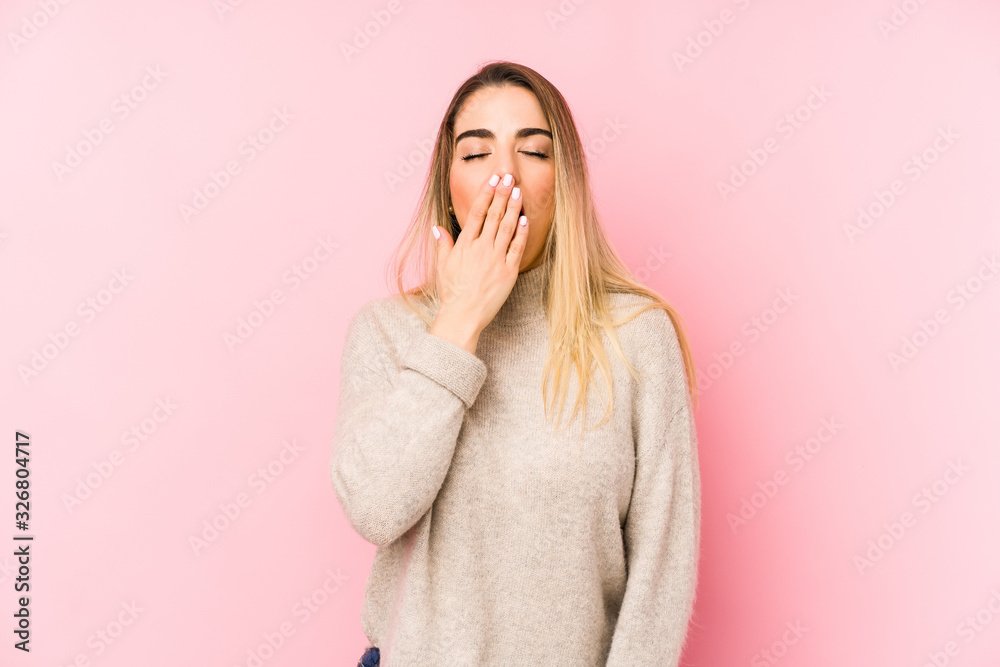 Middle age woman over isolated background yawning showing a tired gesture covering mouth with hand. Middle age woman over isolated background yawning showing a tired gesture covering mouth with hand.