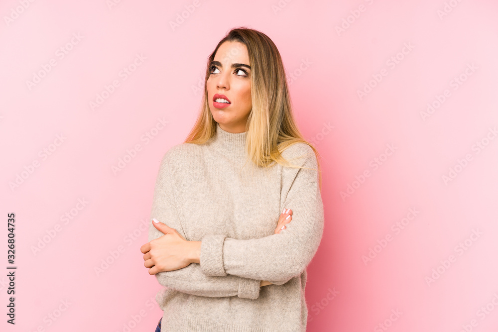 Middle age woman over isolated background tired of a repetitive task. Middle age woman over isolated background tired of a repetitive task.