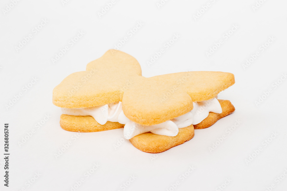Cooking dough from a butterfly shape on a white background Cooking dough from a butterfly shape on a white background