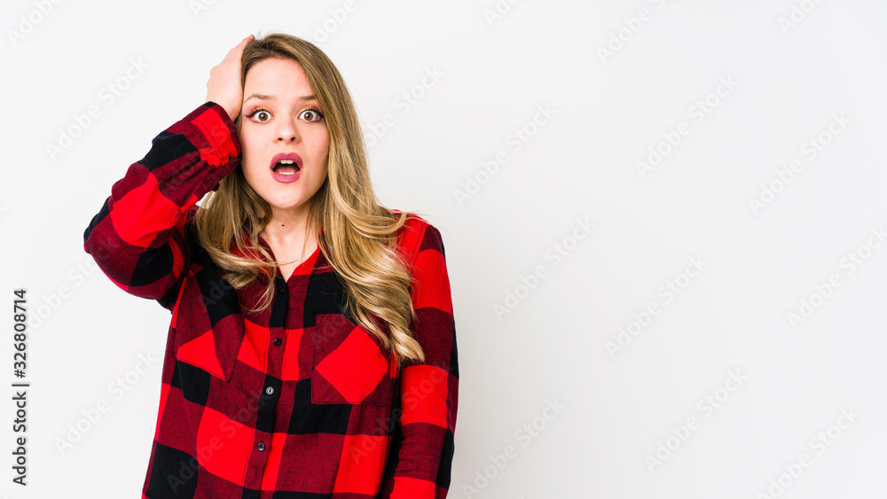 Young cauciasian woman isolated on white background being shocked, she has remembered important meeting. Young cauciasian woman isolated on white background being shocked, she has remembered important meeting.