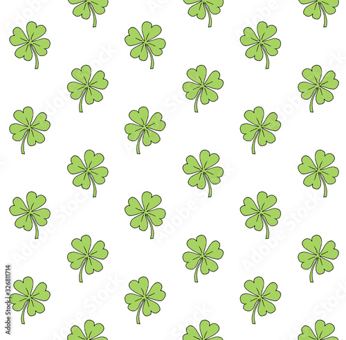 Vector seamless pattern of hand drawn doodle sketch shamrock clover isolated on white background