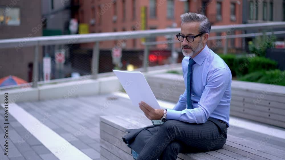 Intelligent man in classic glasses calling to operator for online consultancy about financial report using 4g roaming connection on cellphone device, middle aged male entrepreneur phoning Intelligent man in classic glasses calling to operator for online consultancy about financial report using 4g roaming connection on cellphone device, middle aged male entrepreneur phoning