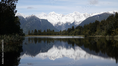 Lake Matheson mountain reflection at Franz Josef Glacier in Westland Tai Poutini National Park, New Zealand. photo