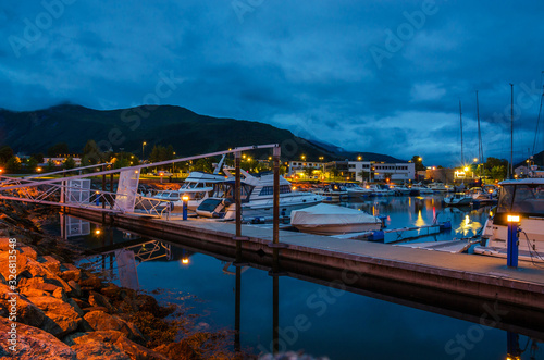 Night panoramic view of beautiful city Orsta, Norway photo