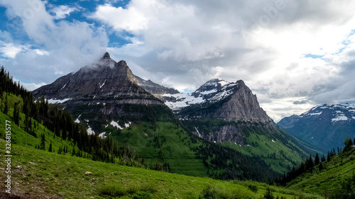 storm clouds clearing from mt oberlin at glacier national park