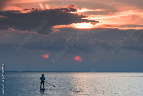 Paddle board at sunset