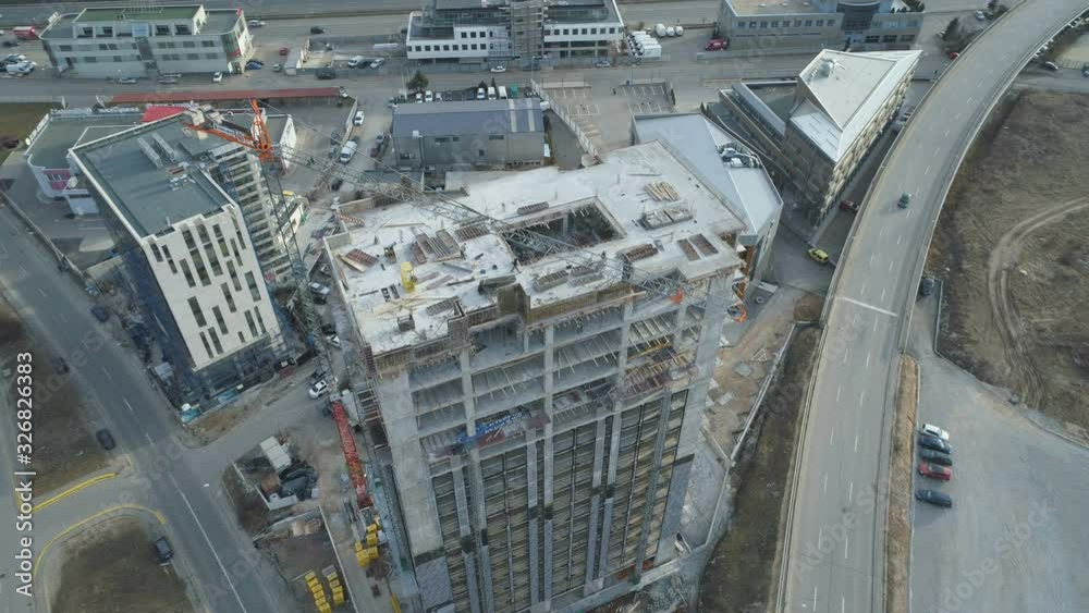 Tower Crane working on multi storey office building. Business Park Sofia, Bulgaria