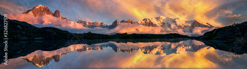 Mountains reflected on a lake in the French Alps, Chamonix at sunrise