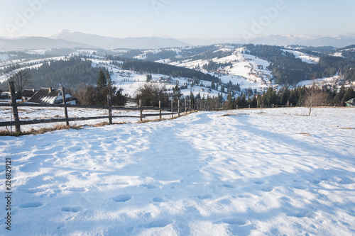 sunny day in snow-covered carpathian mountains in winter