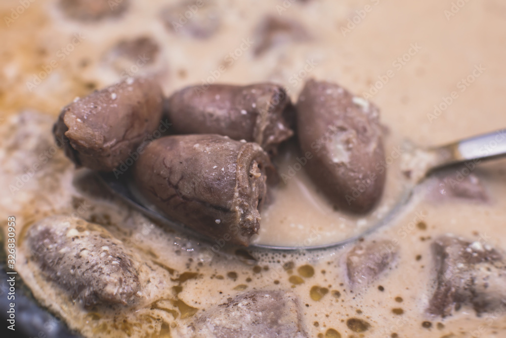 Process of cooking fried roasted grilled chicken hearts with sour cream, fresh raw stewed chicken hearts Process of cooking fried roasted grilled chicken hearts with sour cream, fresh raw stewed chicken hearts
