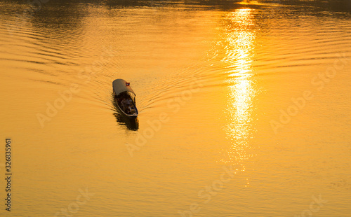 Scenic view of Mekong river against sunset sky