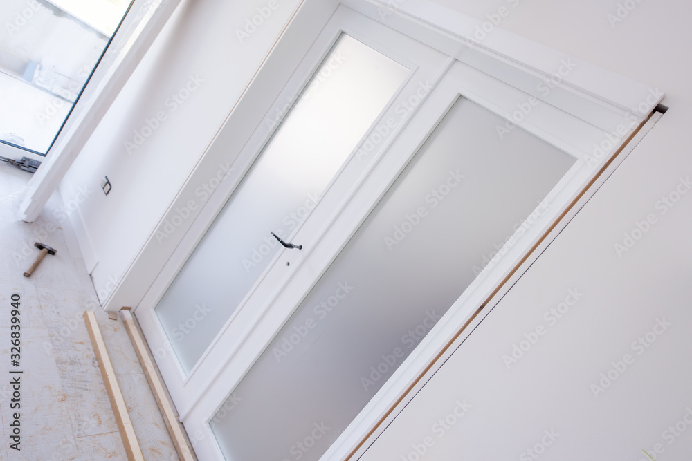 Fototapeta premium double glass door with white wooden frame