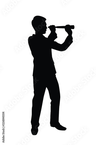 Business man and monocular in hand silhouette