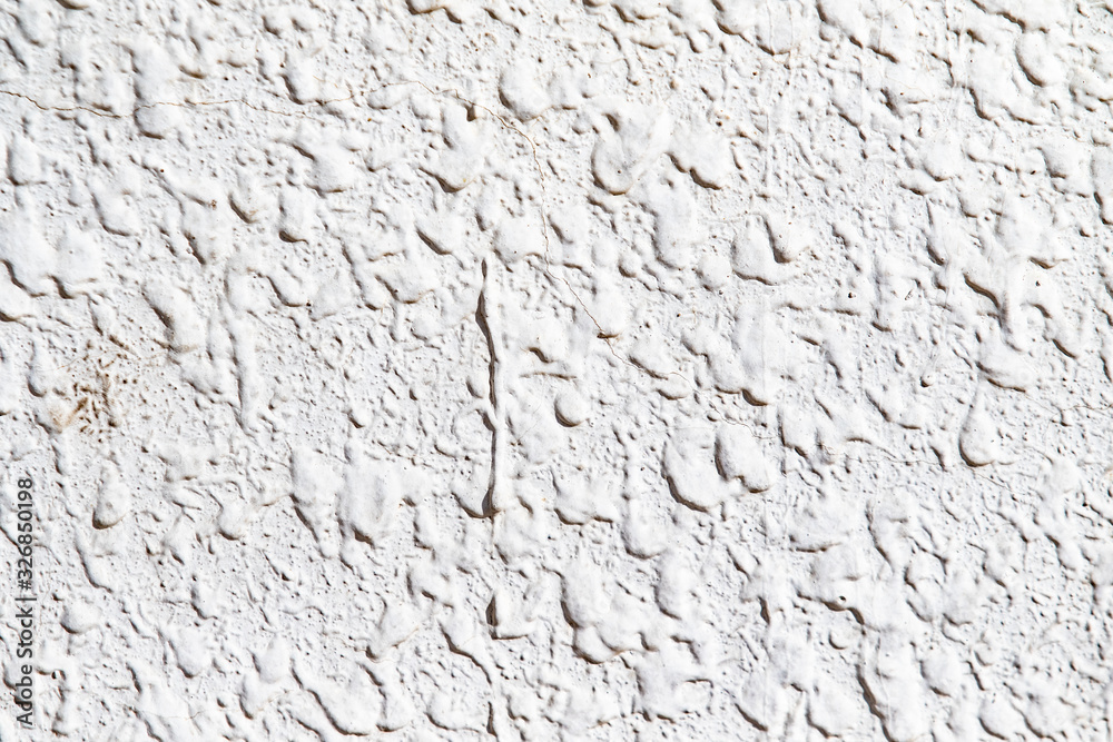 Cement concrete wall texture, white, old, background with a cracked wall. Cement concrete wall texture, white, old, background with a cracked wall.