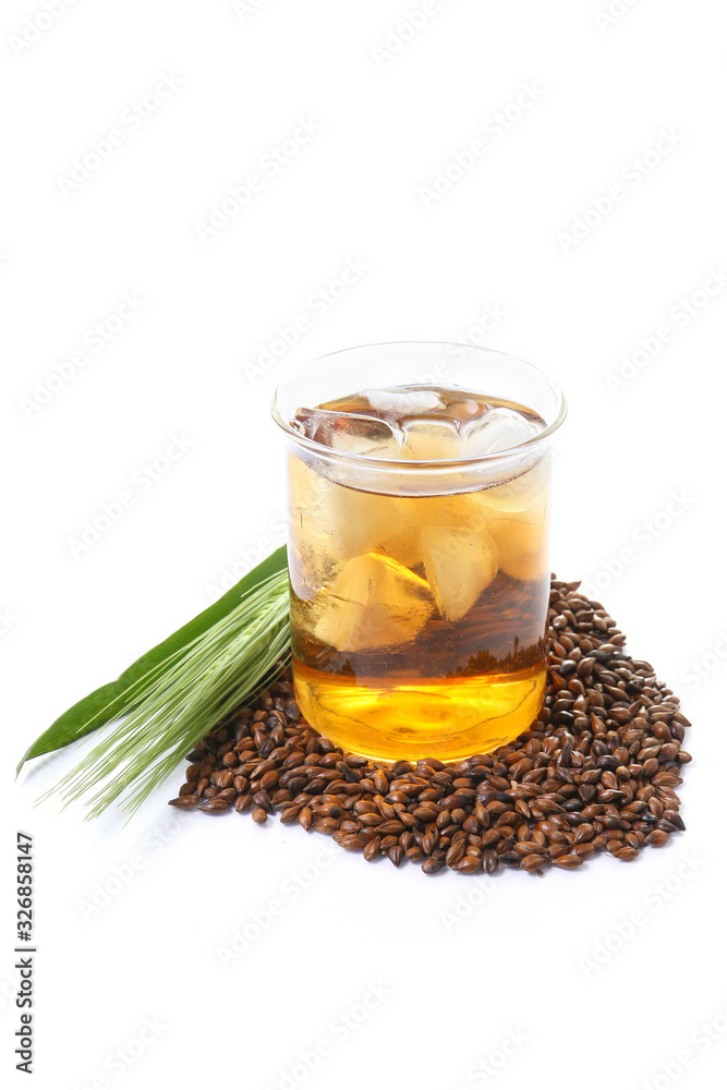 Fototapeta premium iced barley tea in a glass. caffeine free alternative healthy drink