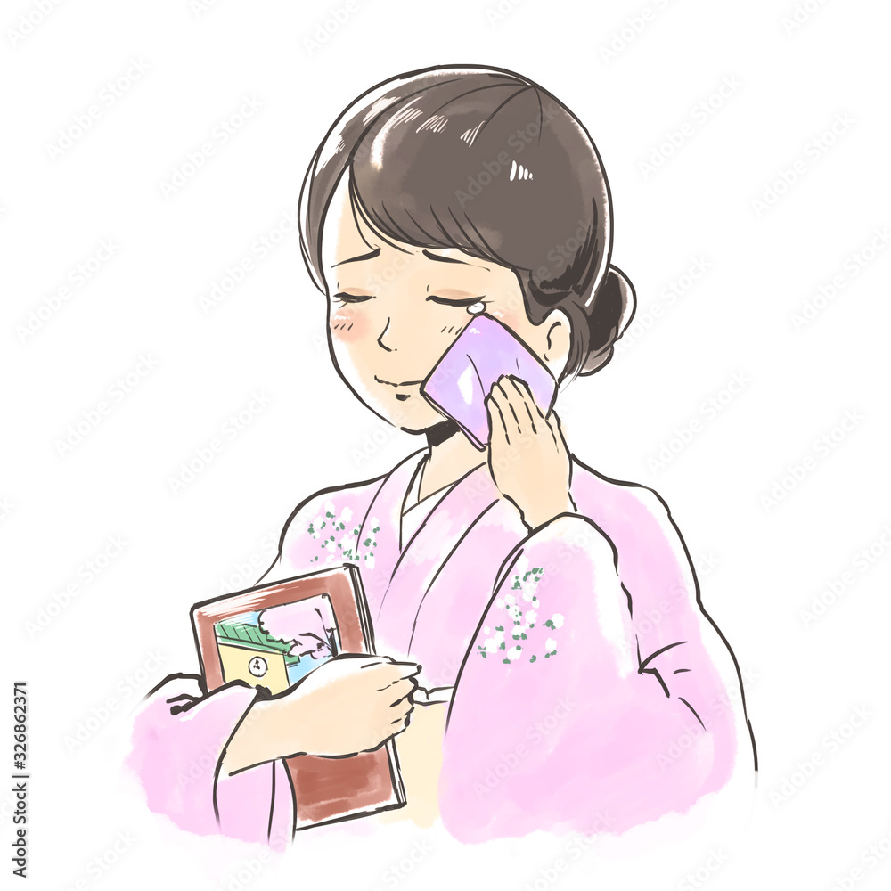 感動して泣く女性(着物)