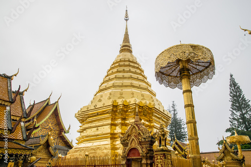 Golden pagoda in wat Phrathat Doi Suthep © poowadon