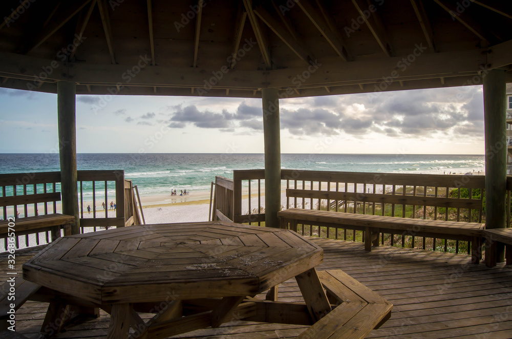 Inside of wooden gazebo by the beach