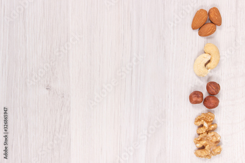 Various nuts and almonds containing healthy natural vitamins and minerals, nutritious eating