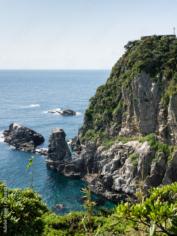 Dramatic cliffs of Cape Ashizuri with viewing platform on top - Ashizurimisaki, Japan