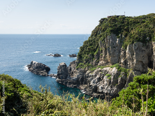 Dramatic cliffs of Cape Ashizuri with viewing platform on top - Ashizurimisaki, Japan © amenohi